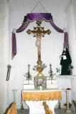 Eglise Saint Martin de Corneilla de la Rivière - Chapelle de St Roch : Elle abrite maintenant un christ sur la croix.