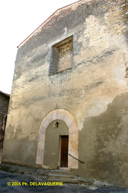 Eglise Saint André de St Féliu d'Avall - Portail de l'église romane aujourd'hui bouché.